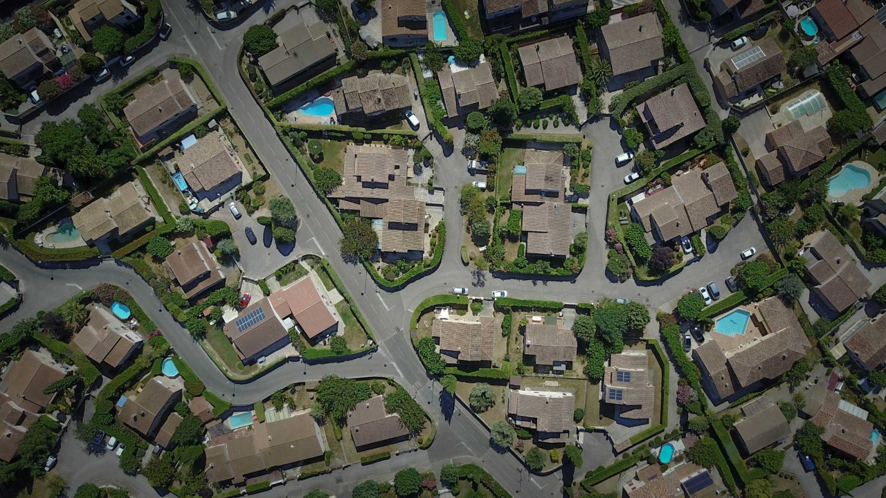 over head view of houses in a neighborhood