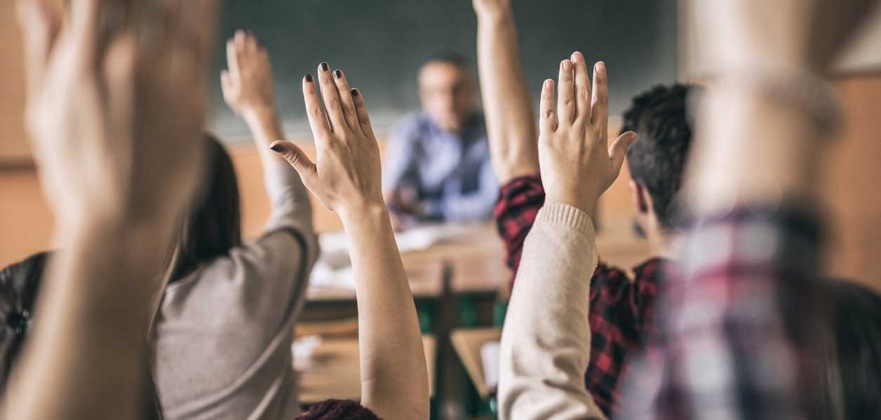 Hands Raised in Class