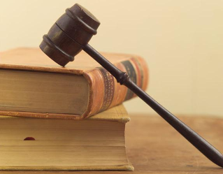 Gavel over books